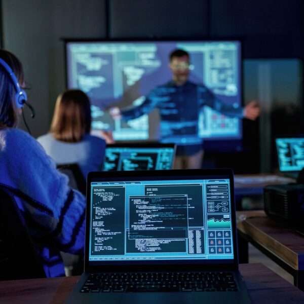 audience-is-with-laptops-male-business-trainer-is-2025-03-18-21-28-00-utc
