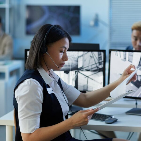 young-woman-wearing-headset-in-security-center-off-2025-03-09-16-49-25-utc